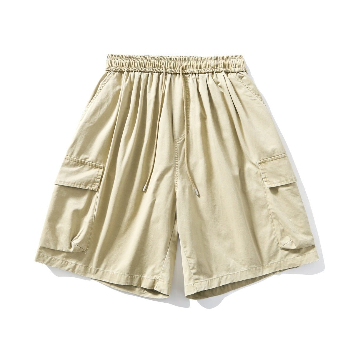 Khaki wide-leg cargo shorts with elastic drawstring waist and large side flap pockets, flat lay front view
