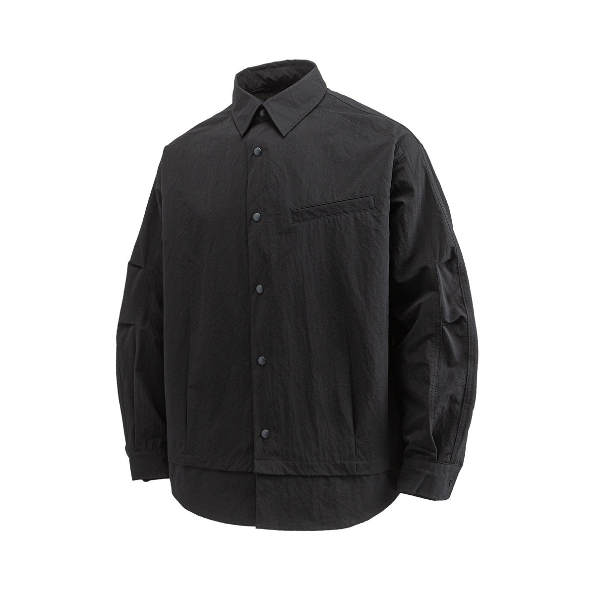 Black long-sleeve snap-front shirt with pointed collar, chest welt pocket and layered hem, front view
