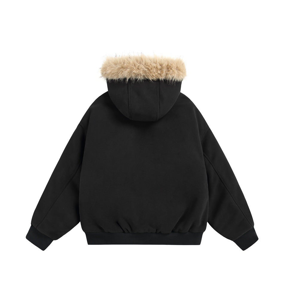 Back view of black hooded jacket with tan fur-like hood trim, ribbed cuffs and hem, and seamed sleeves