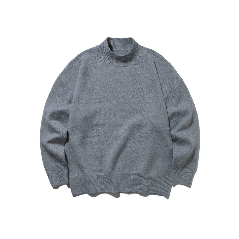 Gray mock-neck knit sweater flat lay, front view, with dropped shoulders and ribbed hem