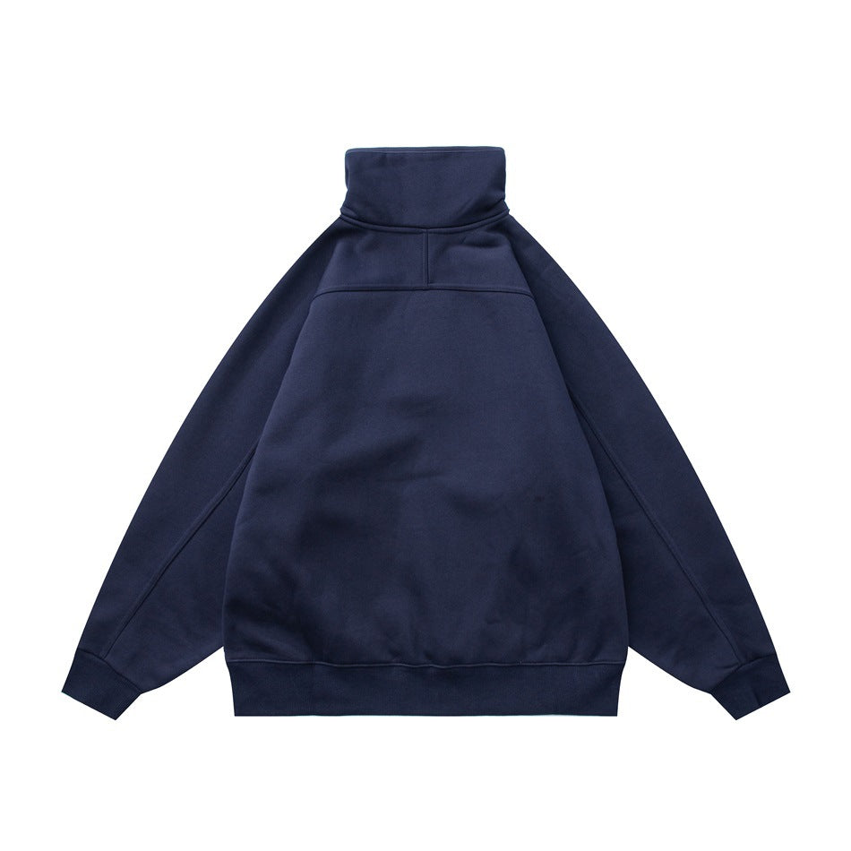 Back view of a navy pullover sweatshirt with a high collar, long sleeves, and ribbed cuffs and hem.