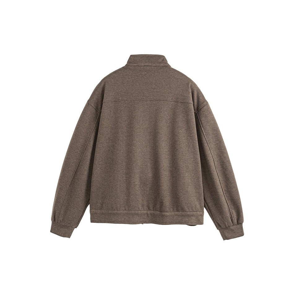 Back view of a brown long-sleeve zip jacket with a stand collar, ribbed cuffs, and hem.