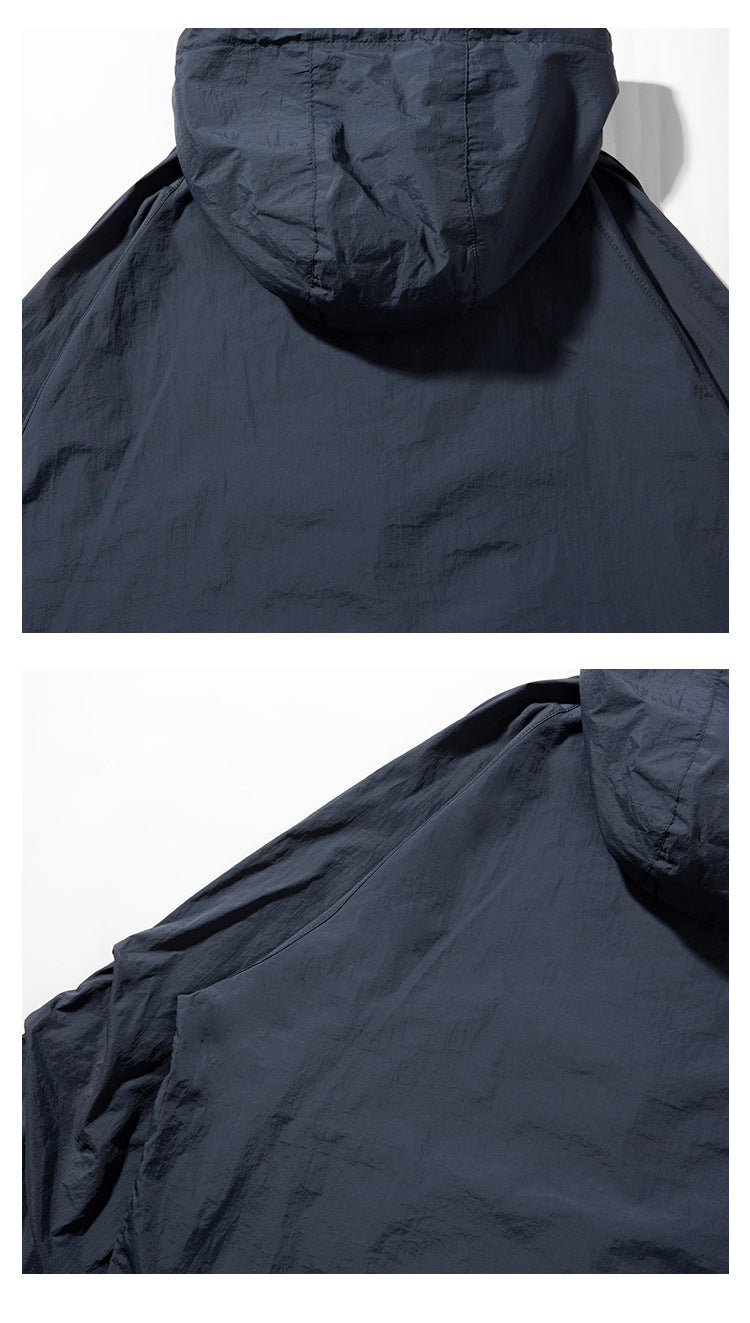 Close views of the navy jacket's hood and back, including the hood-to-shoulder seam.