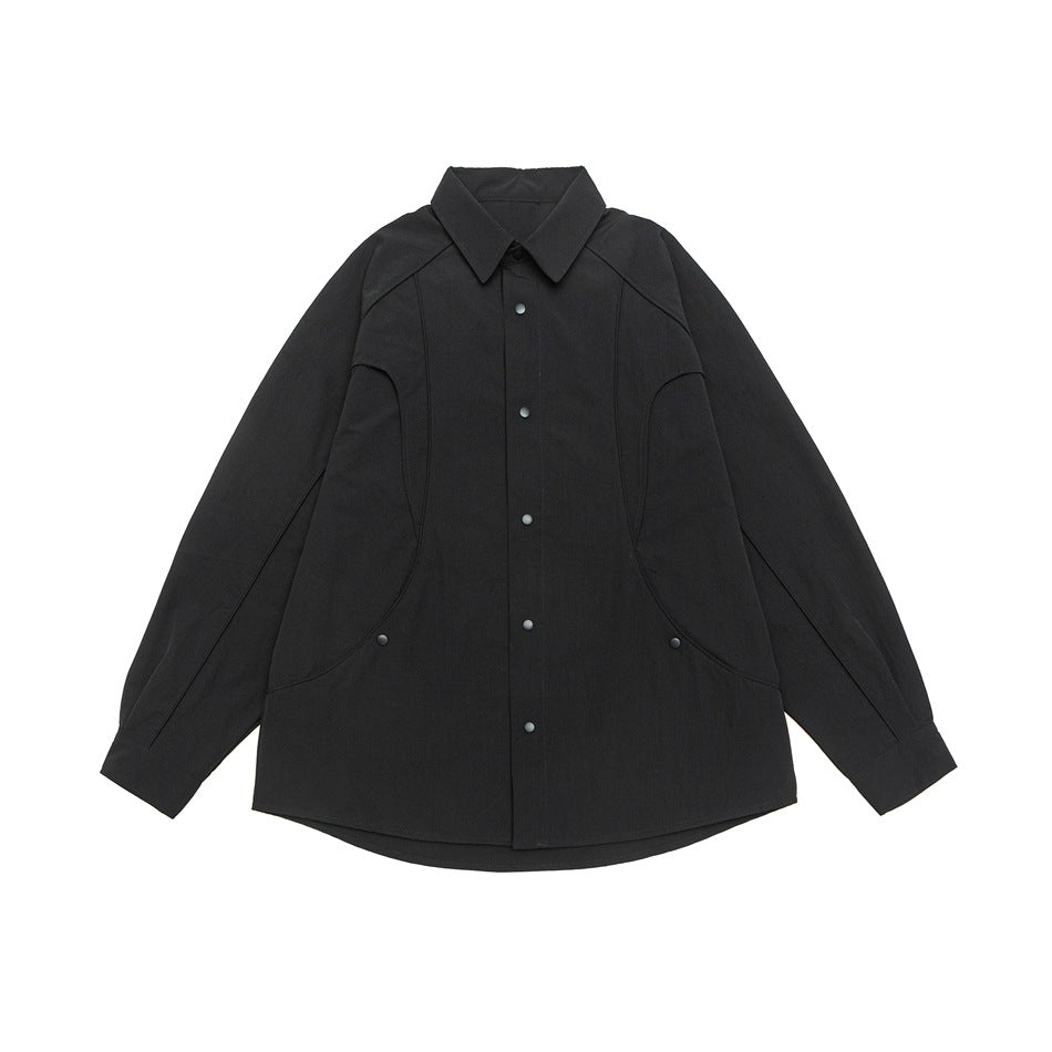 Black long-sleeve snap-front shirt jacket with curved seam panels, flat lay front view