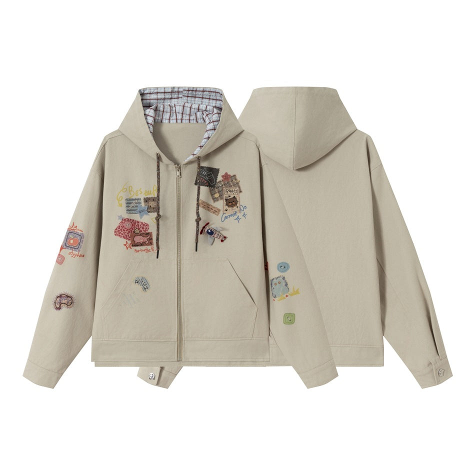Taupe zip hoodie shown from the front and back, with a plaid-lined hood, front pockets, and colorful graphic patches.