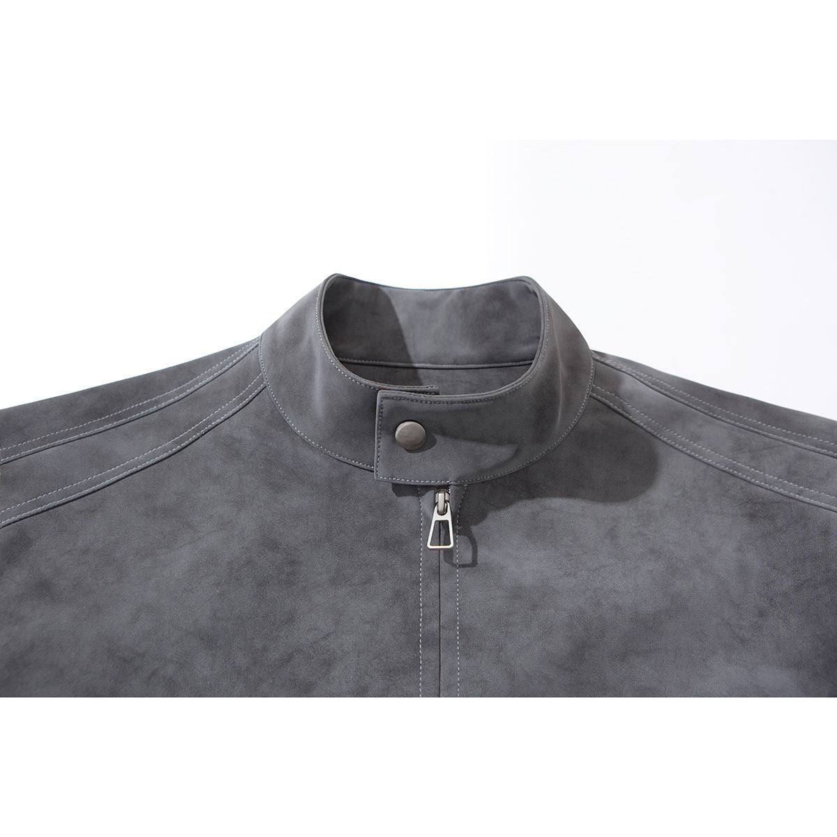 Close-up of a charcoal gray jacket collar with snap tab, front zipper, and contrast stitching.