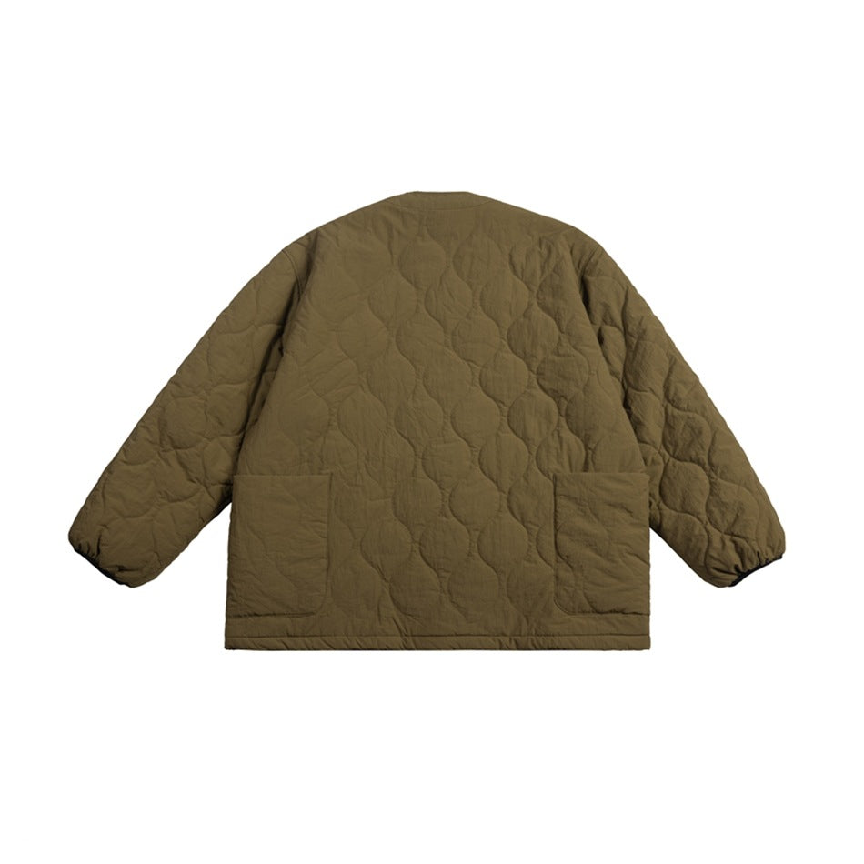 Back view of an olive-brown quilted jacket with a circular stitch pattern, long sleeves, and two patch pockets.