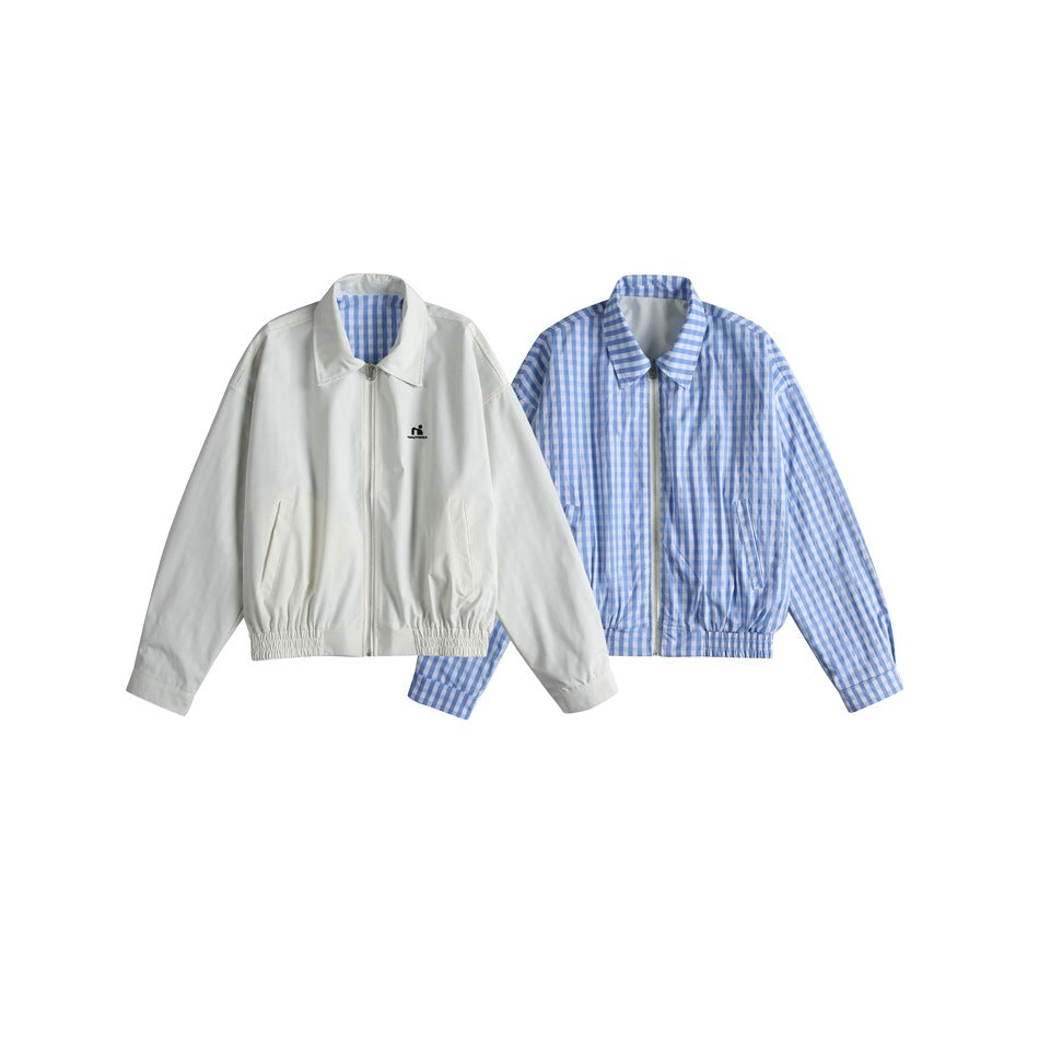 Two zip-up jackets shown together: one white with checked lining and one in blue-and-white checks.