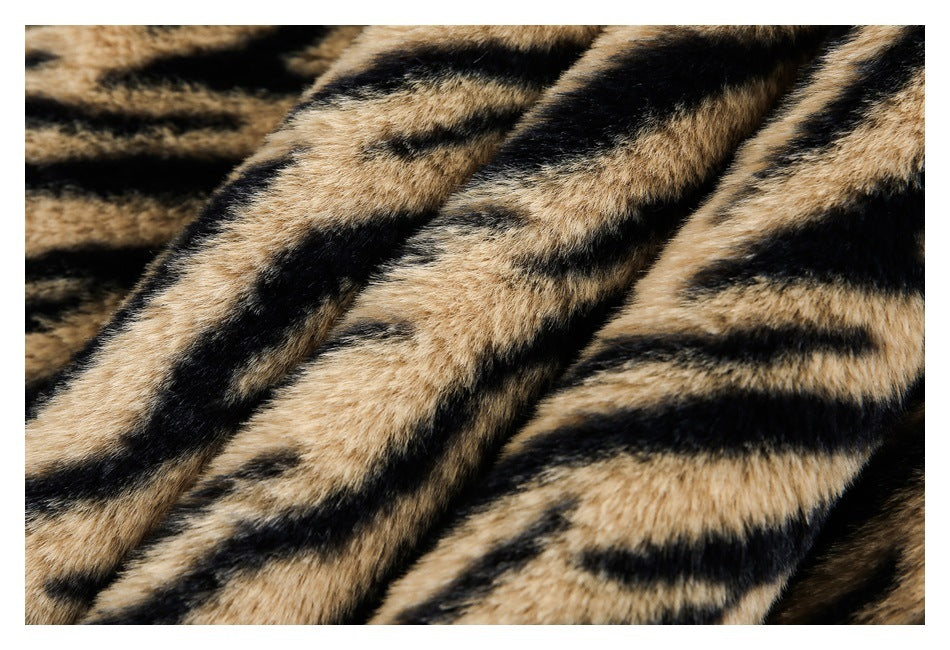 Close-up of folds in tan-and-black tiger-striped faux fur.