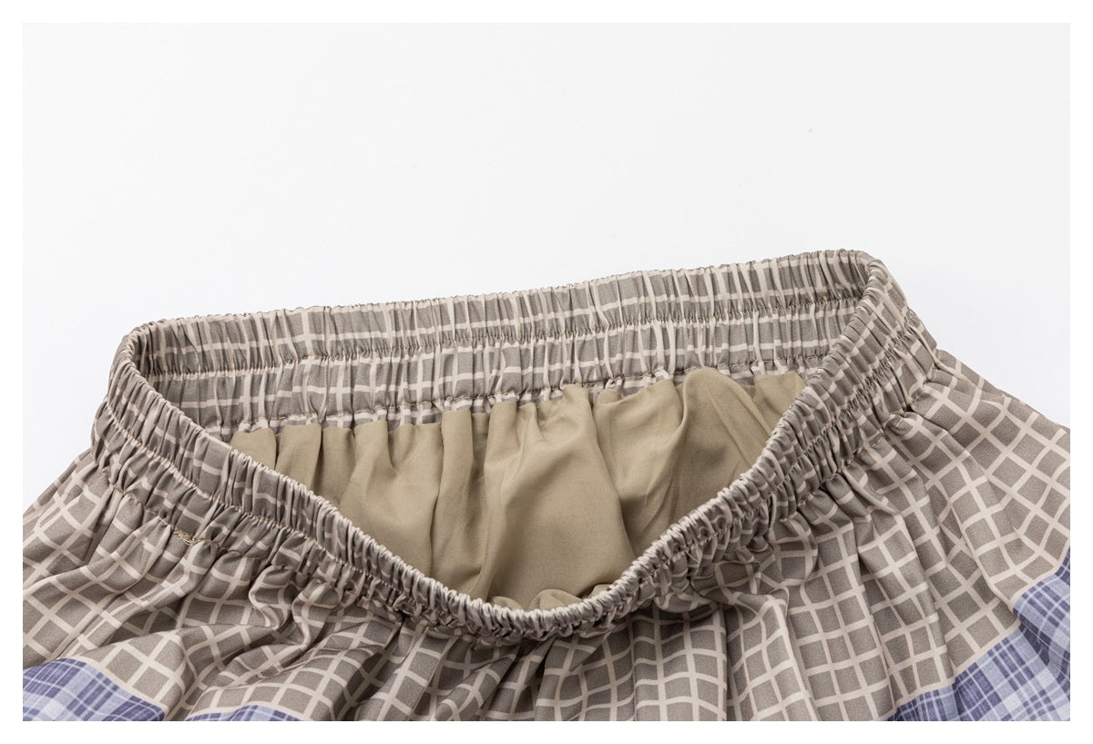 Close-up of the skirt's gathered elastic waistband and beige inner facing.