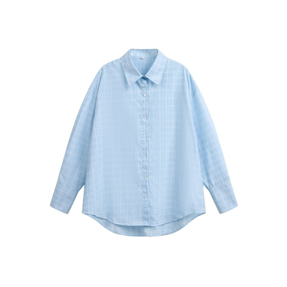 Light blue plaid long-sleeve button-up shirt with pointed collar, flat lay on white background