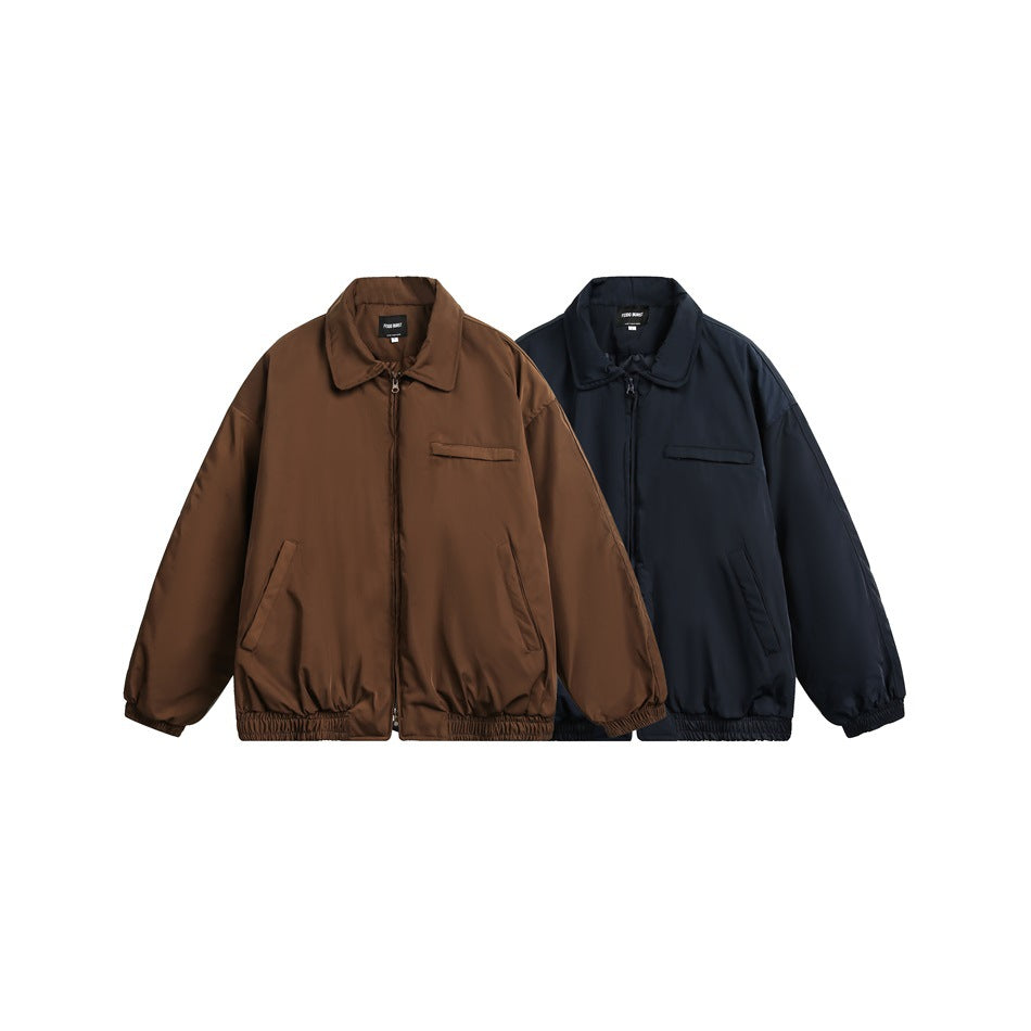 Two jacket colorways displayed together: brown and navy zip jackets with collars, chest pockets and gathered hems.