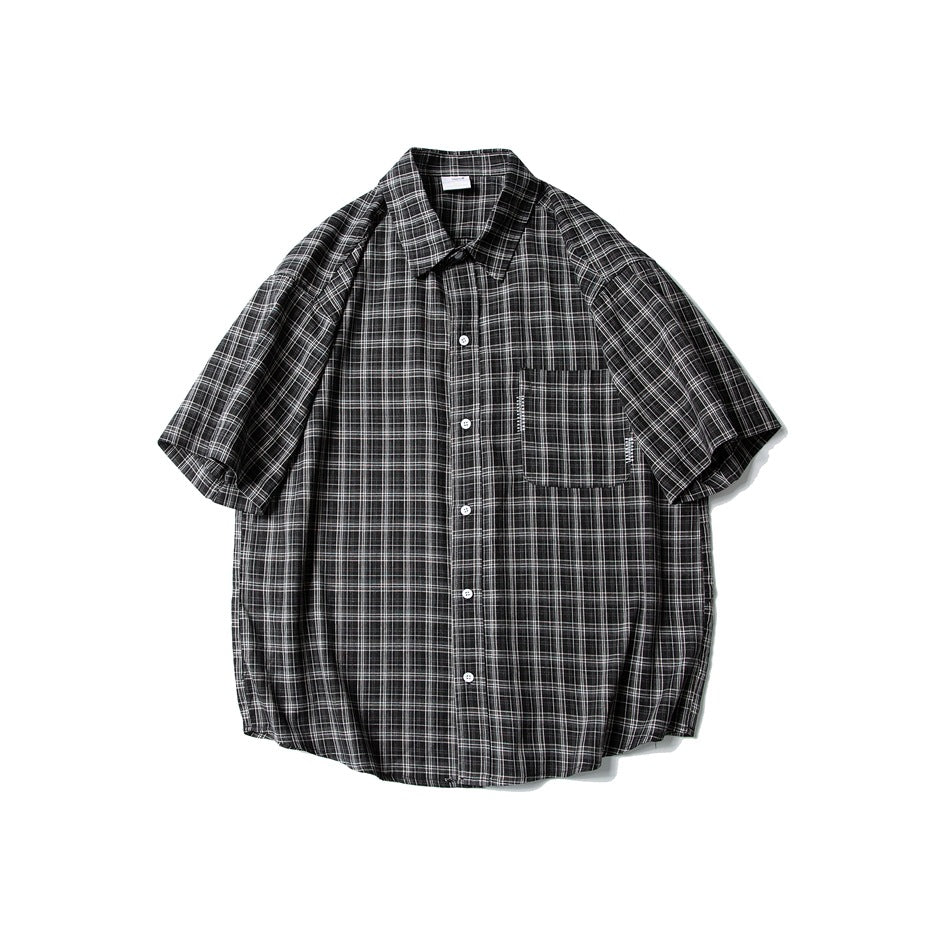 Black and white plaid short-sleeve button-up shirt with chest pocket, flat front view