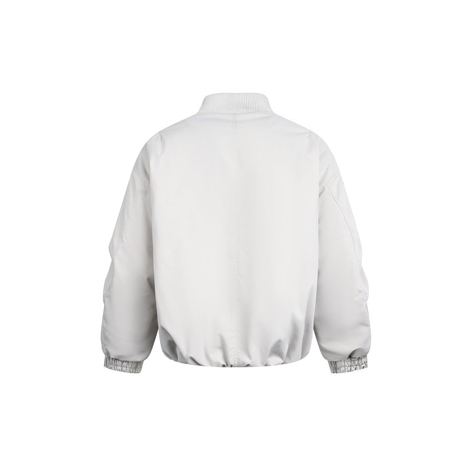 Back view of a light gray bomber jacket with a ribbed collar, long sleeves and elastic cuffs and hem on a white background.