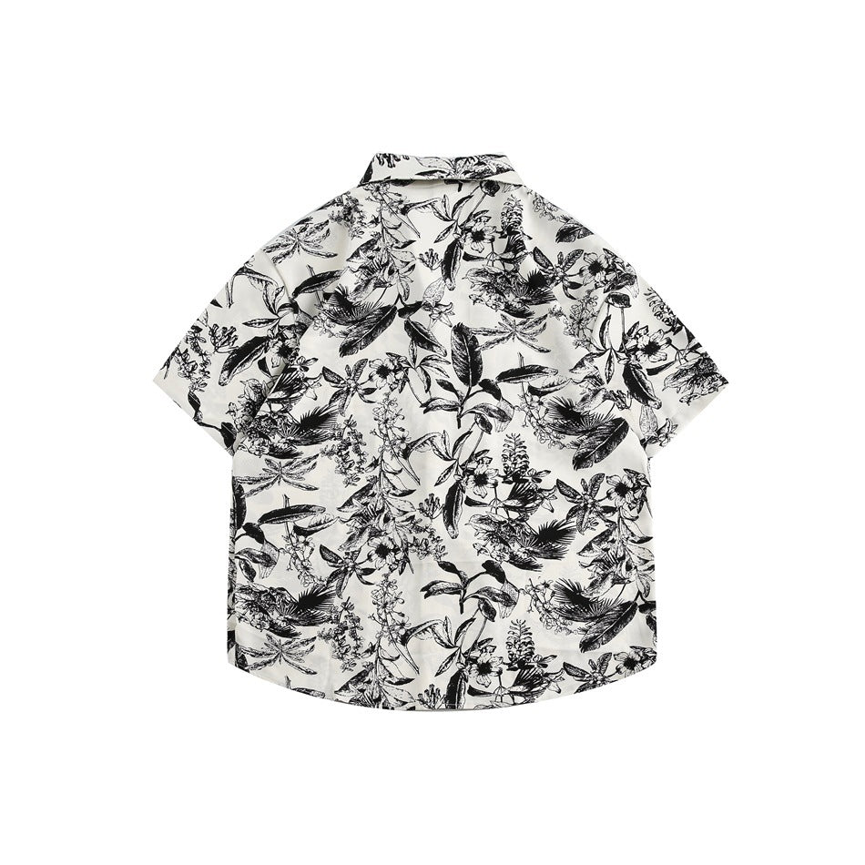 Back view of black and white botanical print short-sleeve shirt, flat lay