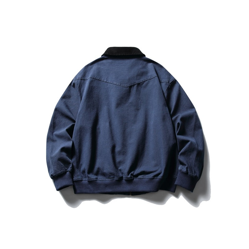 Back view of a dark navy jacket with a black collar and ribbed cuffs and hem.