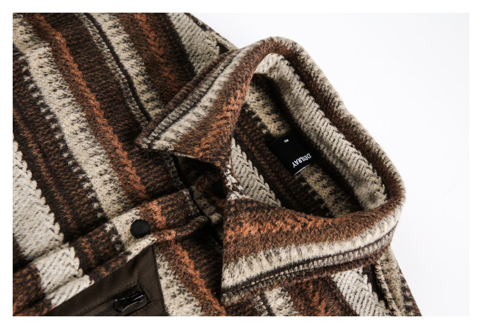 Close-up of the overshirt's wide plaid collar, black snap, and inner neck label.