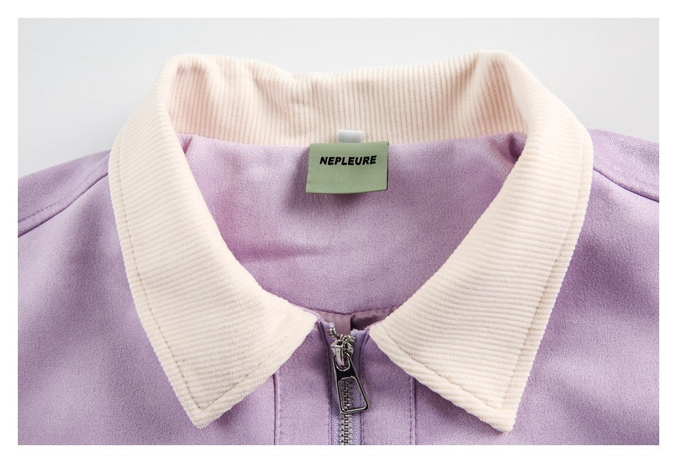 Close-up of the jacket’s cream ribbed collar, lilac fabric, front zipper, and NEPLEURE neck label.