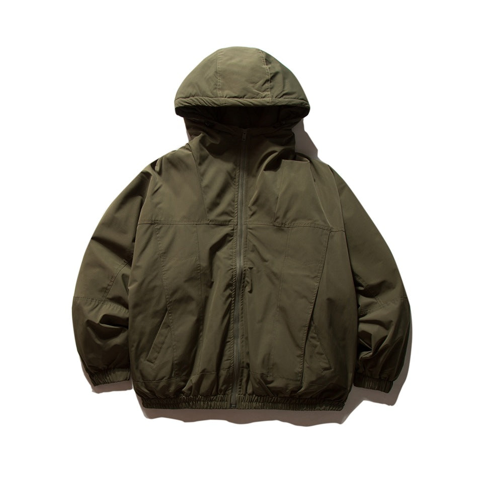 Army green hooded zip-up jacket flat lay, front view, with paneled seams, pockets and elastic cuffs and hem