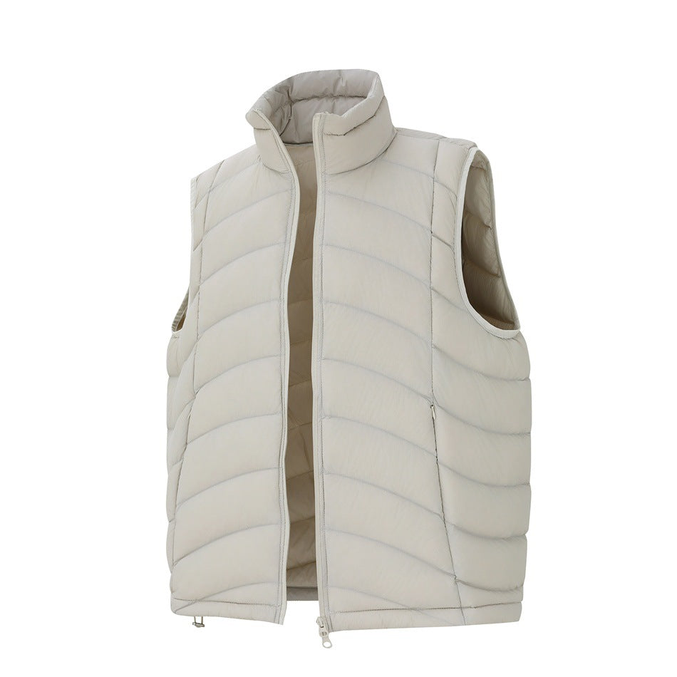 Light gray quilted vest with the front zipper partly open, showing the stand collar, inner lining and side pocket