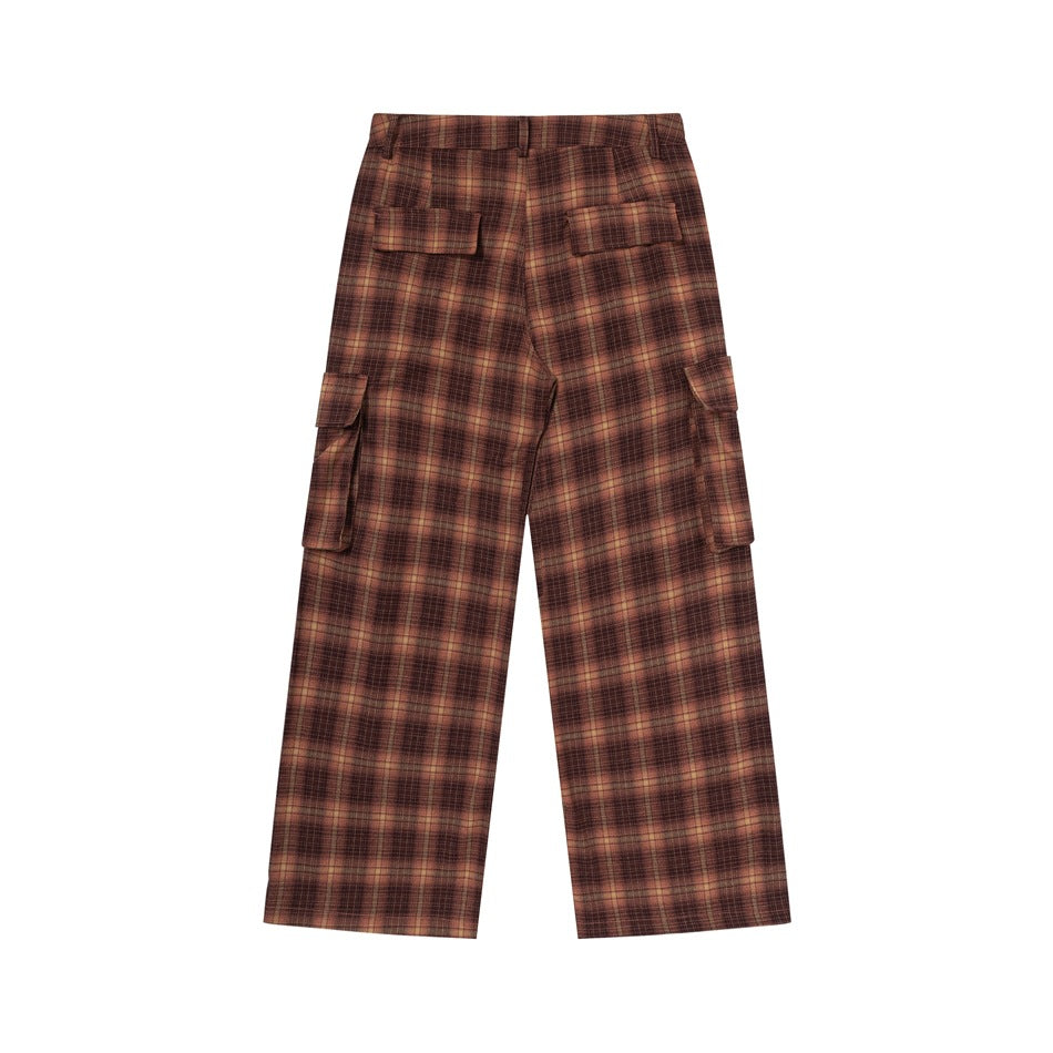 Back view of wide-leg brown-and-tan plaid cargo trousers with flap pockets.