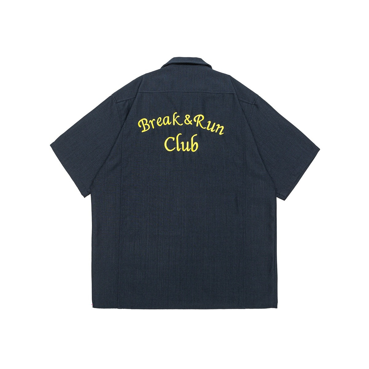 Back view of a dark navy short-sleeve button-up shirt with yellow “Break & Run Club” embroidery across the upper back.