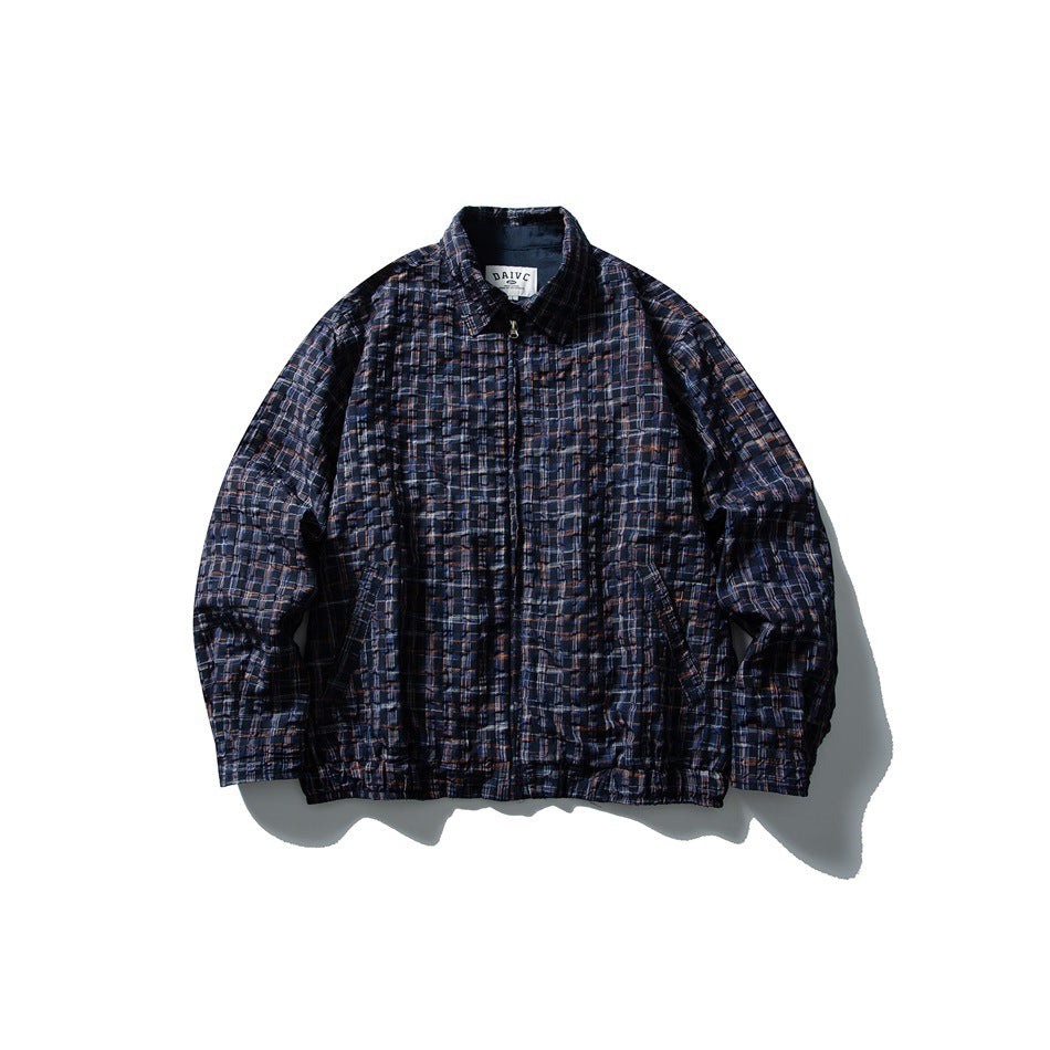 Navy checked zip-front collared jacket with textured surface, flat lay front view