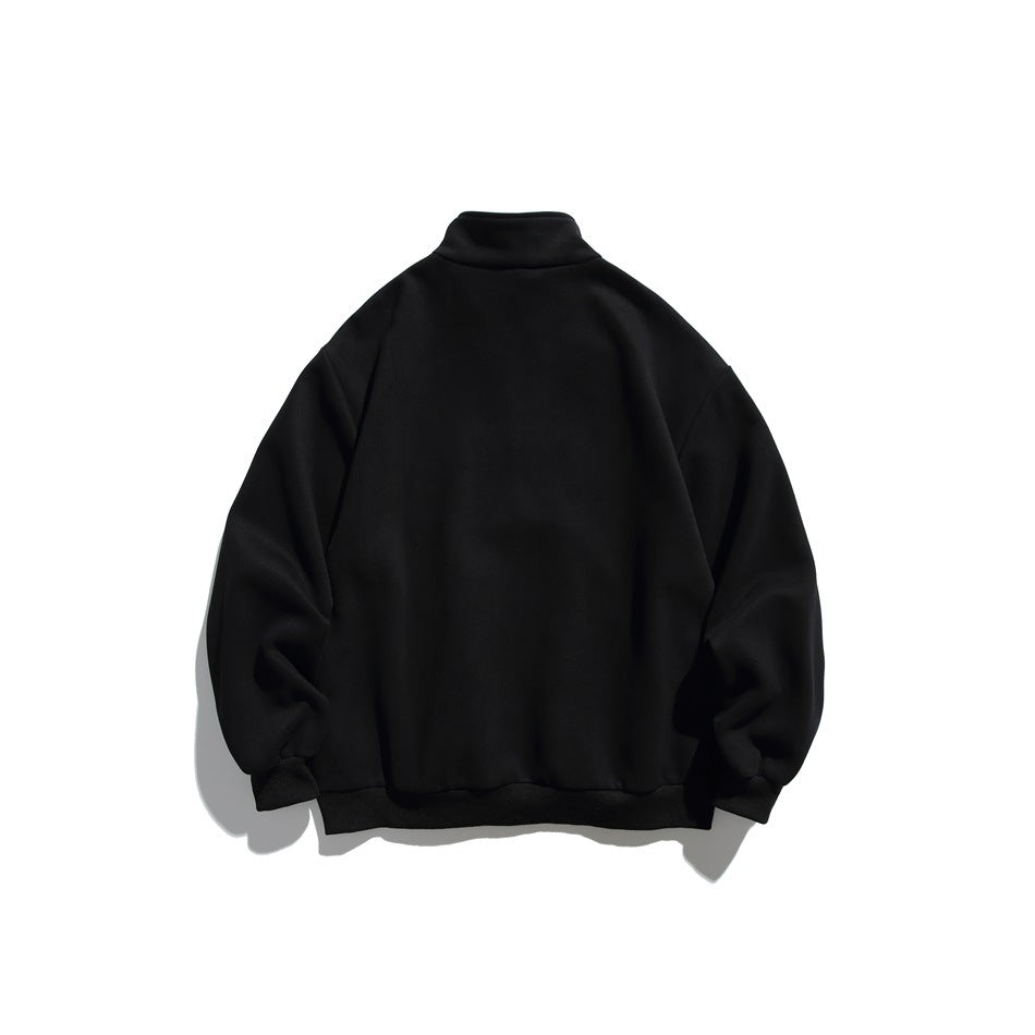 Back view of a plain black quarter-zip sweatshirt with a raised collar and ribbed hem and cuffs.