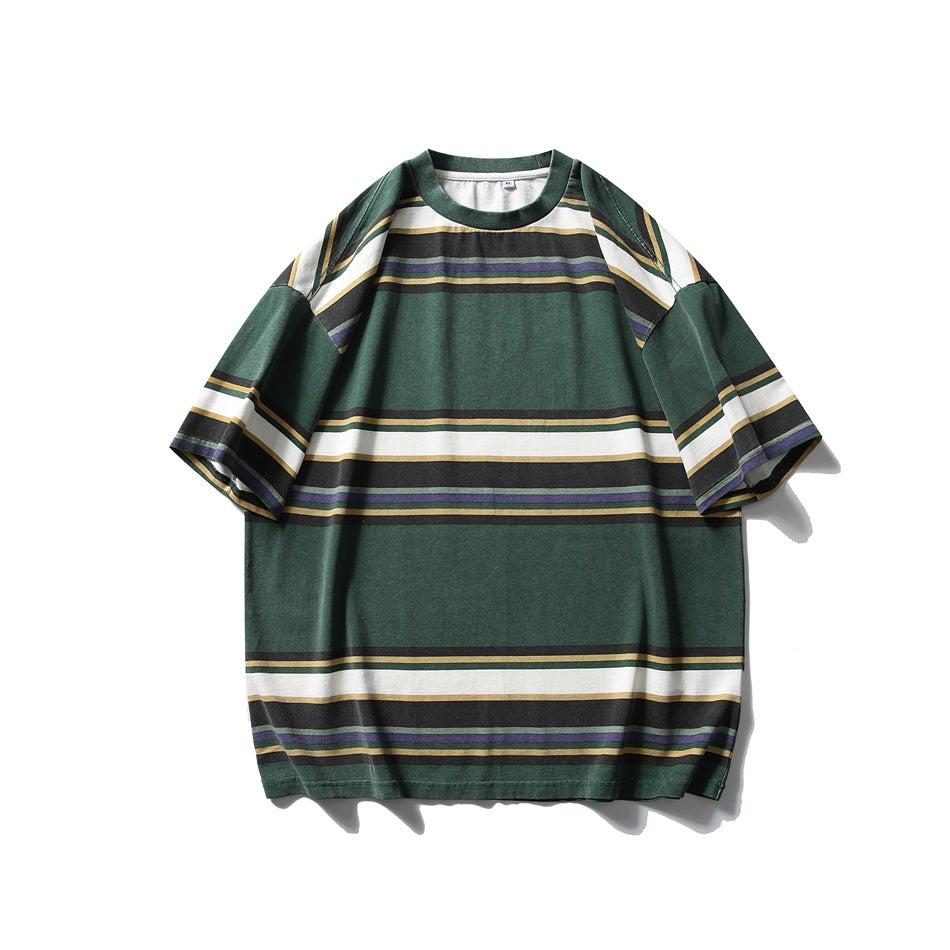Green crew-neck short-sleeve T-shirt with black, white, yellow and purple horizontal stripes, flat lay front view