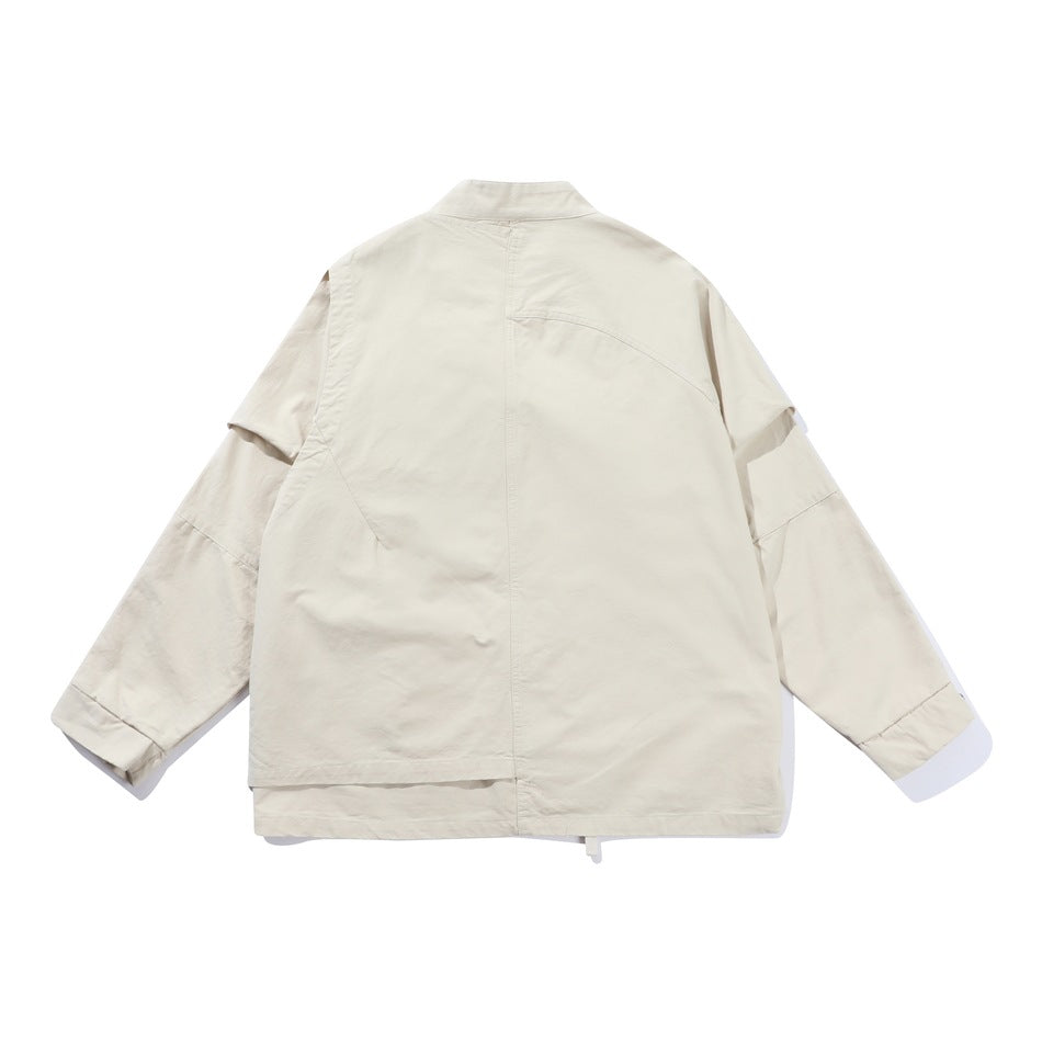 Back view of an off-white jacket with a short stand collar and panel seams.