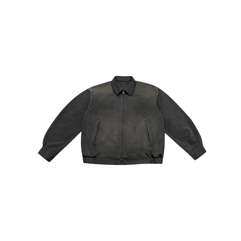 Washed black collared zip-up jacket flat lay with faded finish, slanted pockets and elastic hem