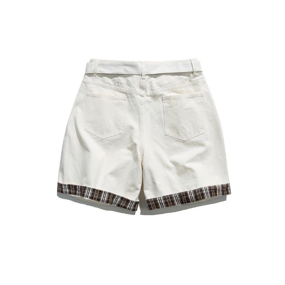 Back view of off-white shorts with two patch pockets, belt loops and plaid cuffed hems