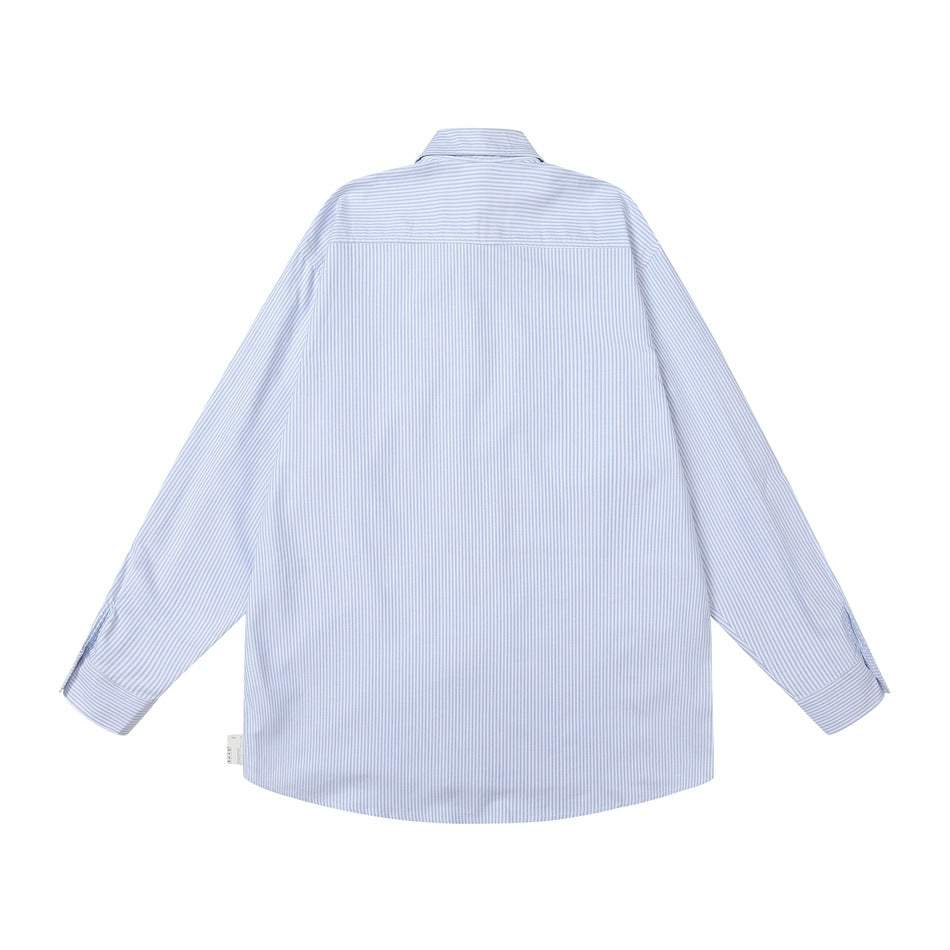 Back view of a light blue pinstriped long-sleeve shirt with a horizontal shoulder yoke.