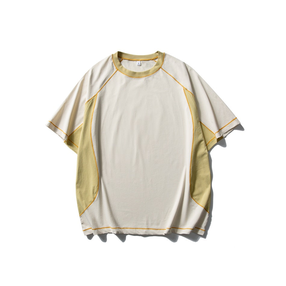 Sand-colored short-sleeve T-shirt flat lay with khaki side panels and neckband and yellow contrast topstitching