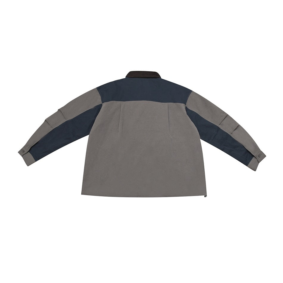 Back view of gray jacket with dark blue yoke and sleeve panels, brown collar and cuff buttons