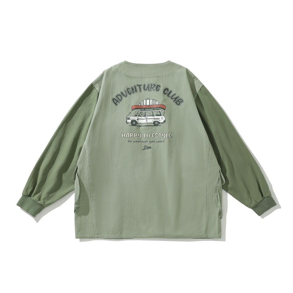 Back of a sage-green jacket with long sleeves and a printed Adventure Club camping-car graphic and slogans.