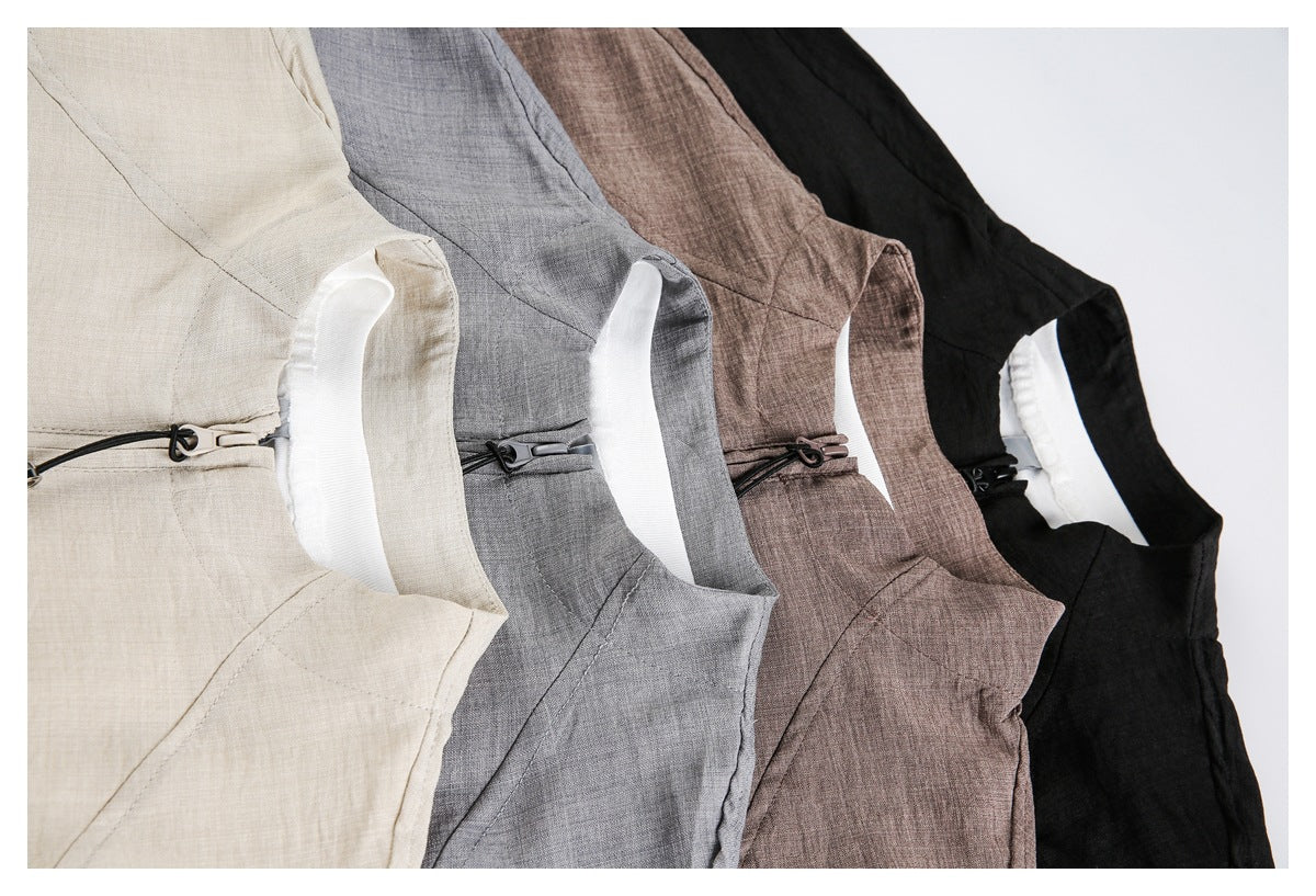 Close-up of four zip-neck pullovers arranged together in light beige, gray, taupe and black.