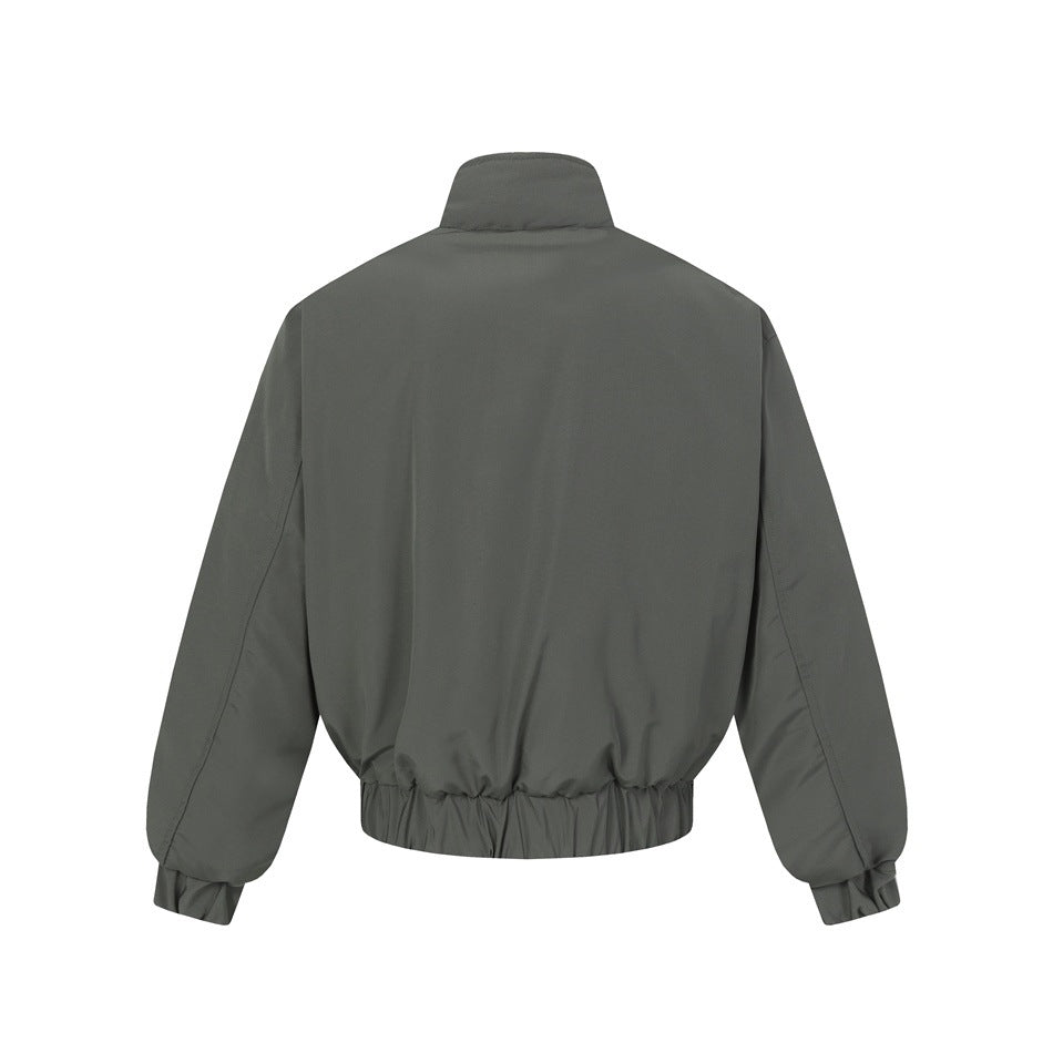 Back view of a dark gray jacket with long sleeves, a stand collar, and a gathered hem and cuffs.