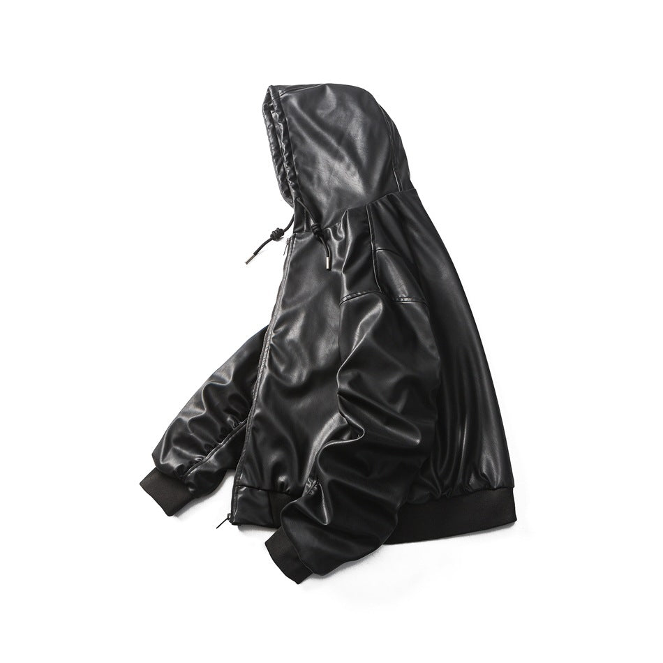 Angled side view of a black glossy hooded jacket laid flat, showing its hood, sleeve, and ribbed hem.