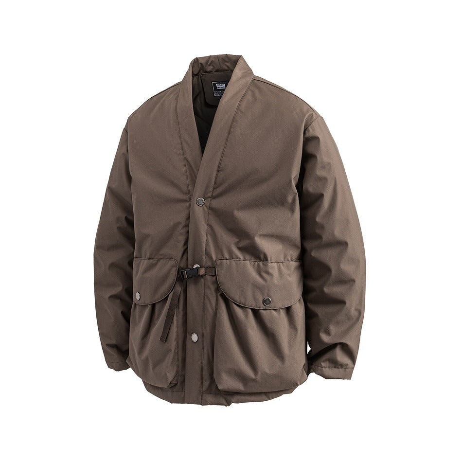 Brown padded jacket with collarless V-neck, snap placket, large flap pockets and waist buckle strap, angled front view