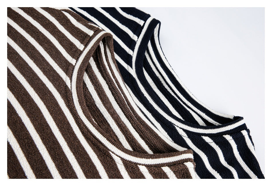Close-up of the rounded necklines and striped knit fabric in brown and black colorways.