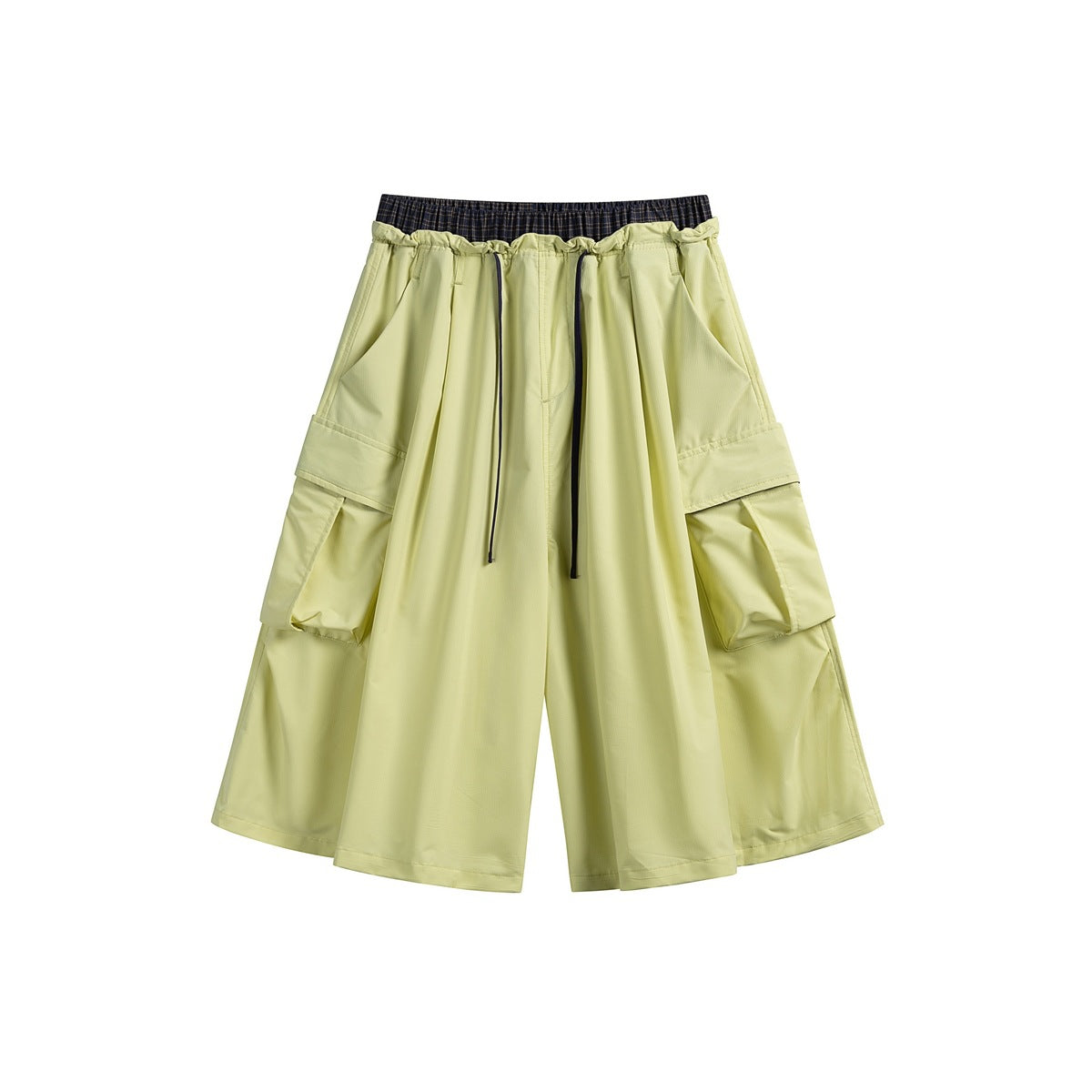 Mustard yellow knee-length wide-leg cargo shorts with drawstring, dark plaid inner waistband and flap pockets