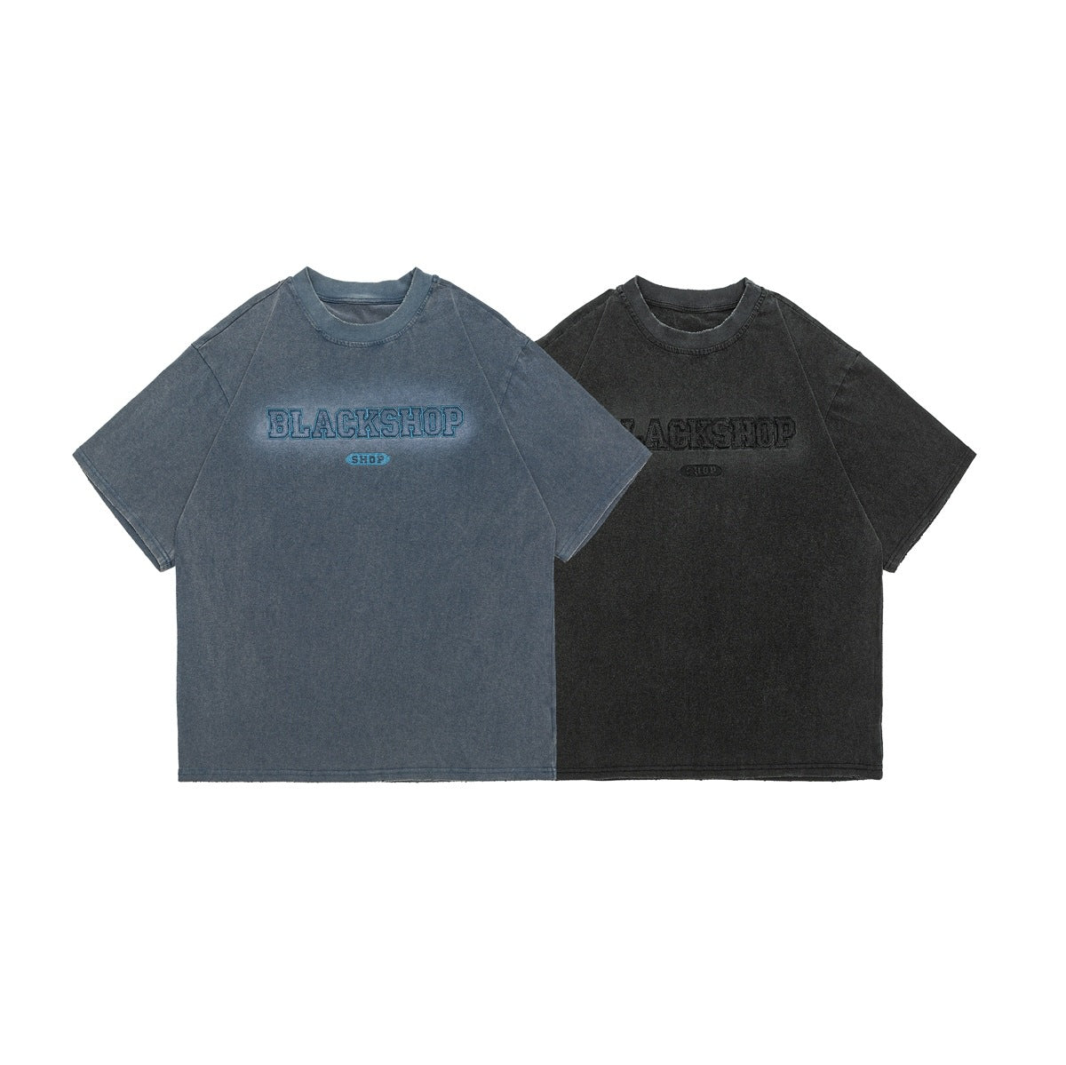 Front view of two oversized short-sleeve T-shirts, faded blue and black, with embroidered chest lettering.