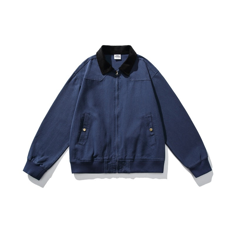 Navy blue zip jacket with black corduroy collar, snap-flap side pockets and ribbed cuffs and hem, flat lay
