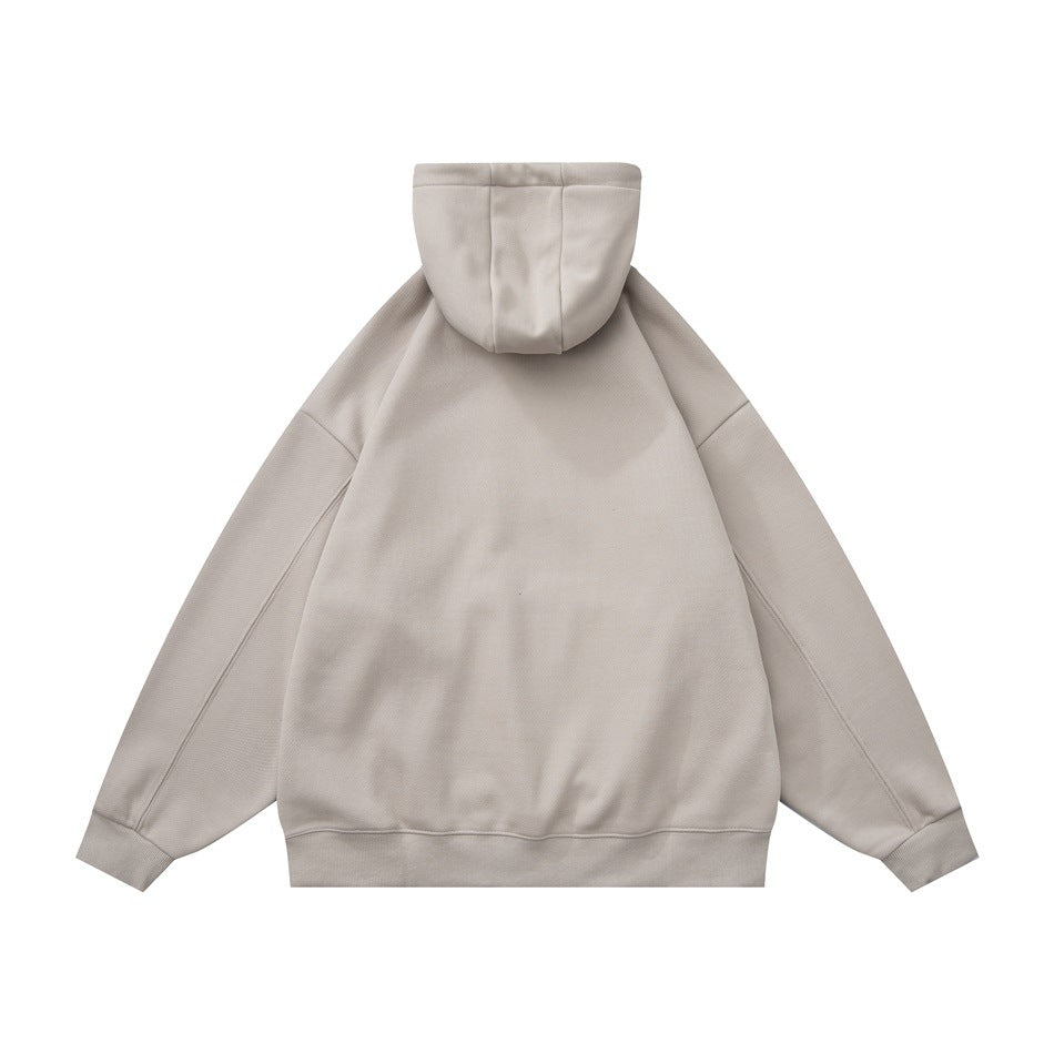 Back view of a light beige pullover hoodie with a hood, long sleeves, and ribbed cuffs and hem.