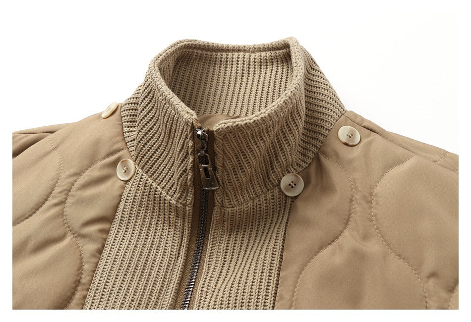 Close-up of the tan jacket's rib-knit collar and zip front, with buttons at the shoulders.