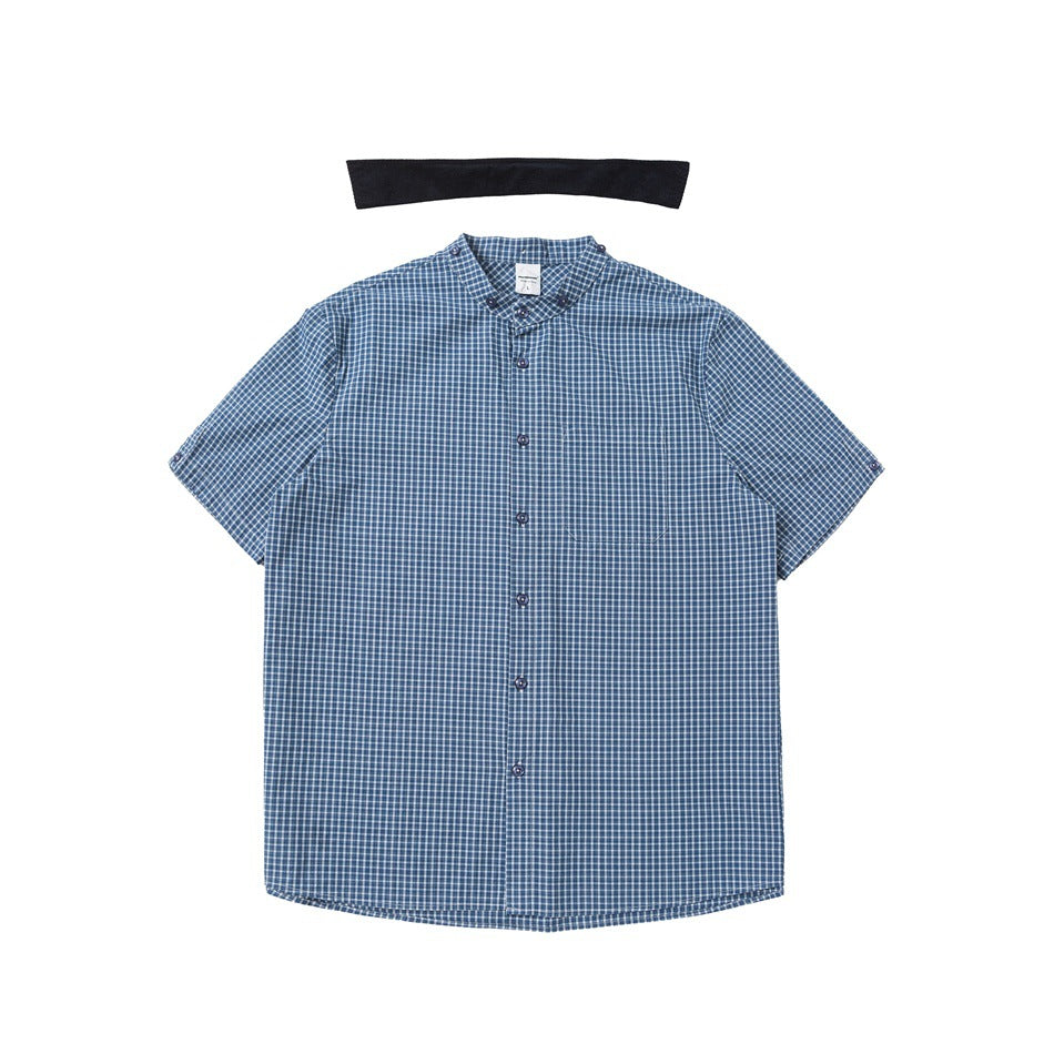 Front view of a blue-and-white checked short-sleeve button-up shirt with a stand collar and dark buttons.