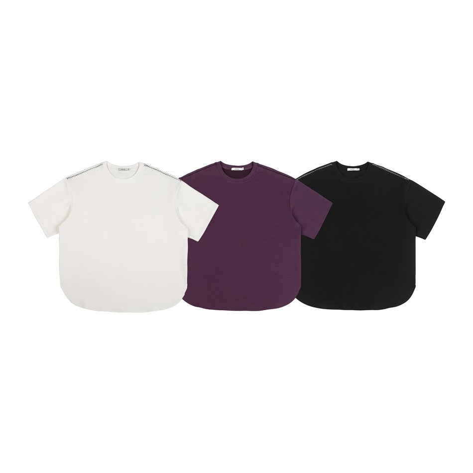Three short-sleeve crewneck T-shirts shown from the front in white, plum, and black, with curved hems and shoulder stitching.