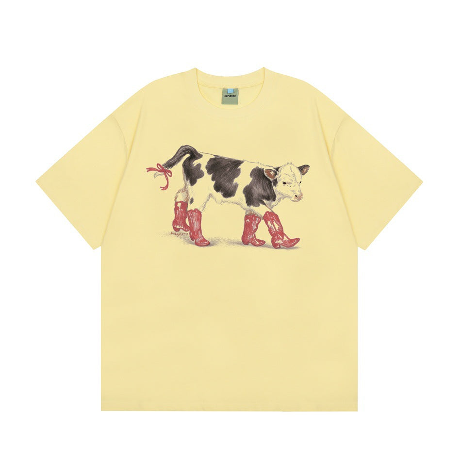 Light yellow short-sleeve crew-neck T-shirt with a calf in red cowboy boots print on the chest
