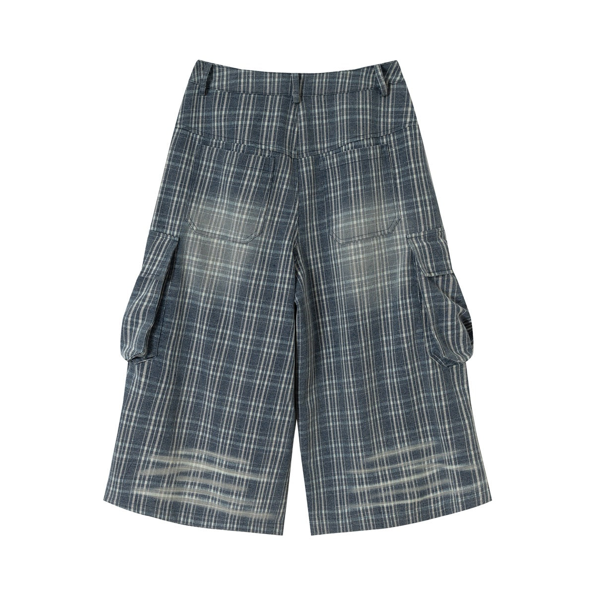Back of blue plaid knee-length cargo shorts with two patch pockets, side flap pockets and faded wash at hems